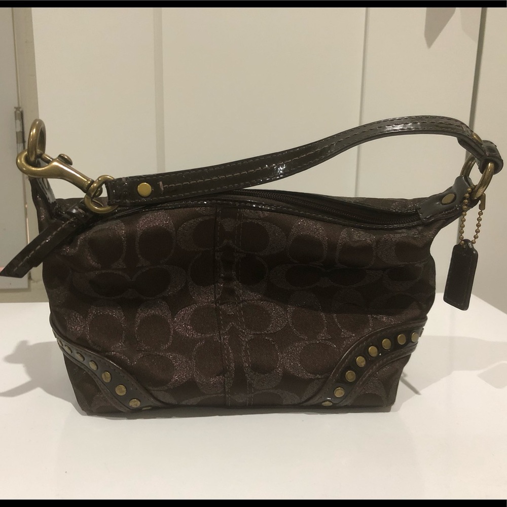 Coach embossed brown small handbag $45